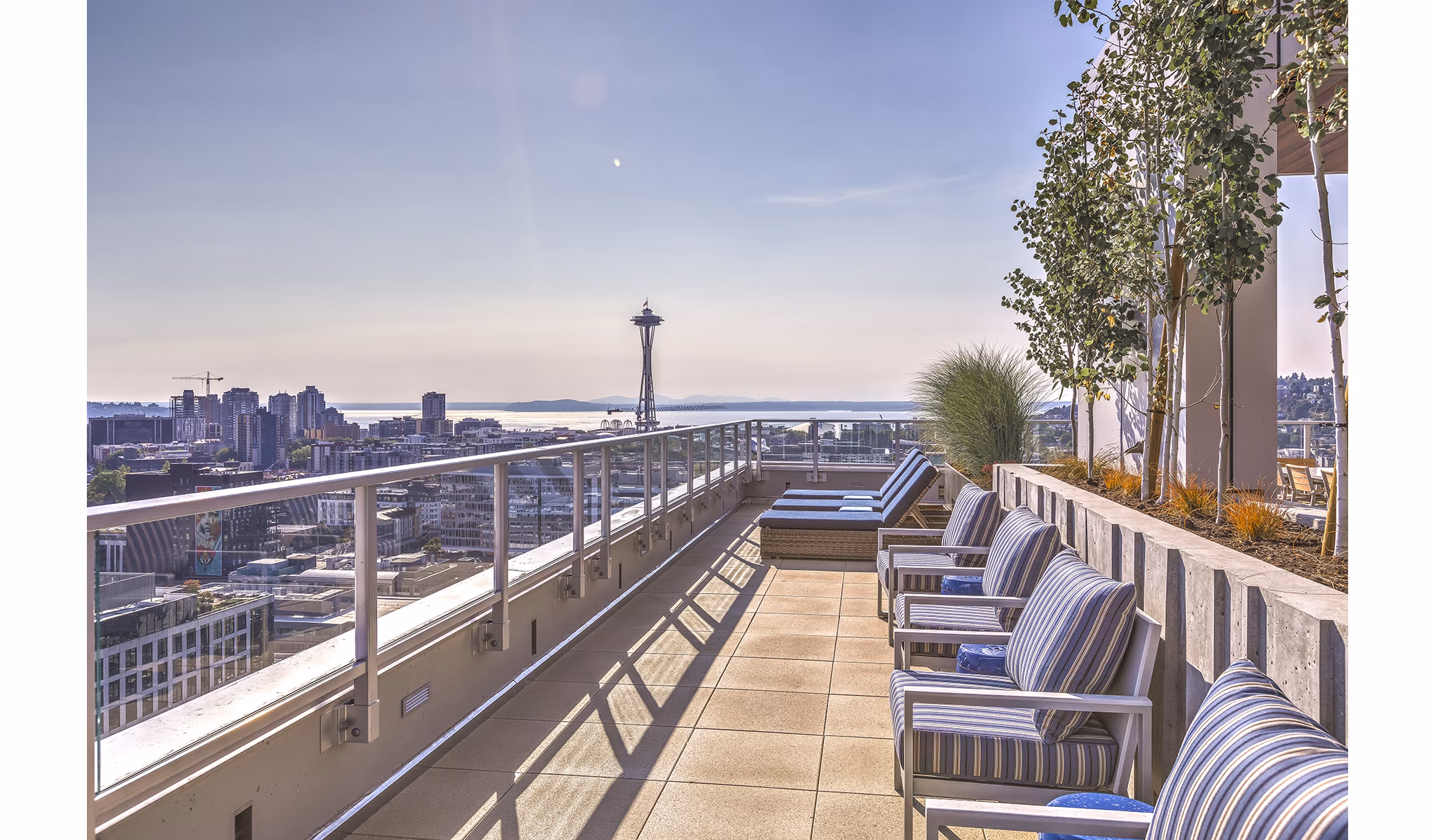 Scenic views from rooftop deck at Ascent South Lake Union Apartments, perfect for relaxation and entertainment in luxurious Seattle living