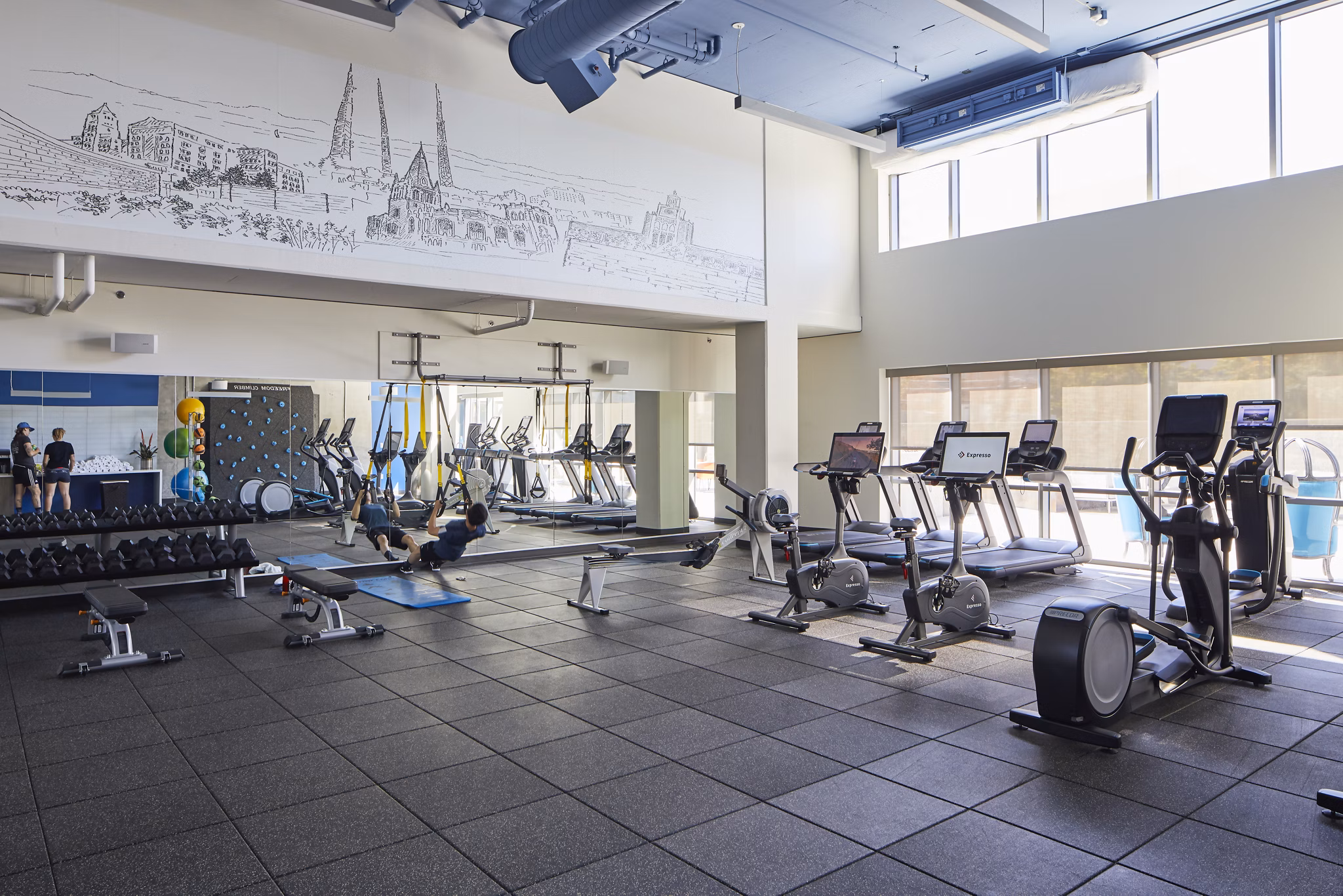 fitness center at The Danforth Apartments