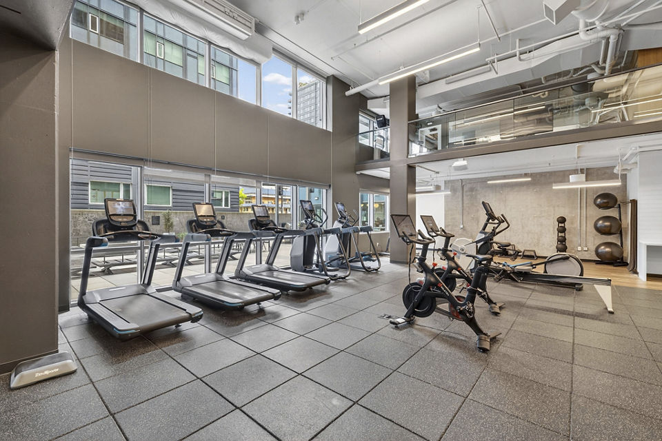fitness center at The Danforth Apartments