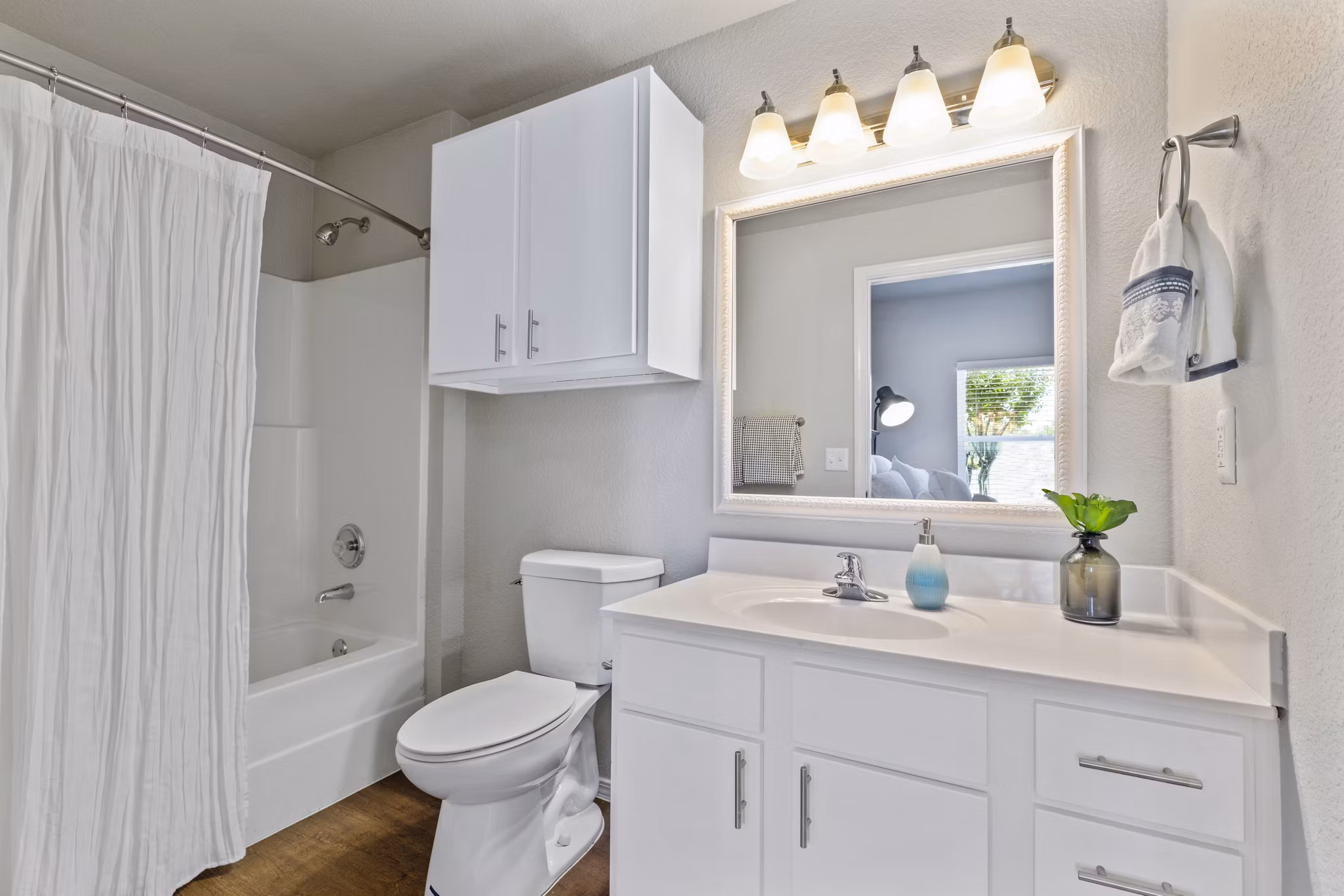 Modern bathroom with sleek fixtures at Timberlinks at Denton Apartments