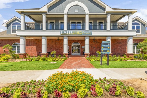 Modern clubhouse with stylish seating and billiards table at Timberlinks at Denton Apartments Enjoy luxury living and community events in this inviting space