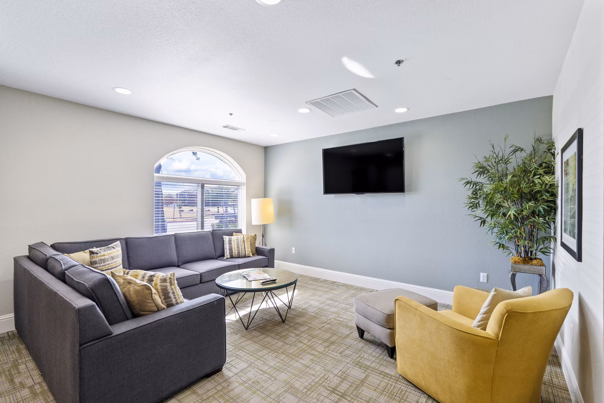 Chic clubhouse with modern decor at Timberlinks at Denton Apartments, a luxury community offering premium amenities and lifestyle features
