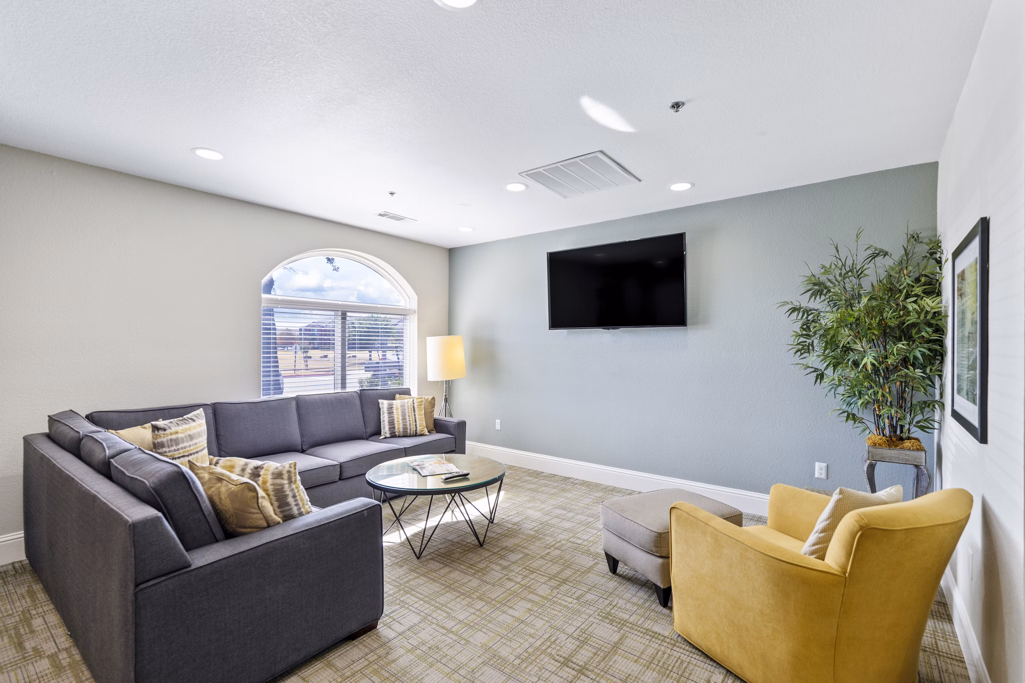 Chic clubhouse with modern decor at Timberlinks at Denton Apartments, a luxury community offering premium amenities and lifestyle features