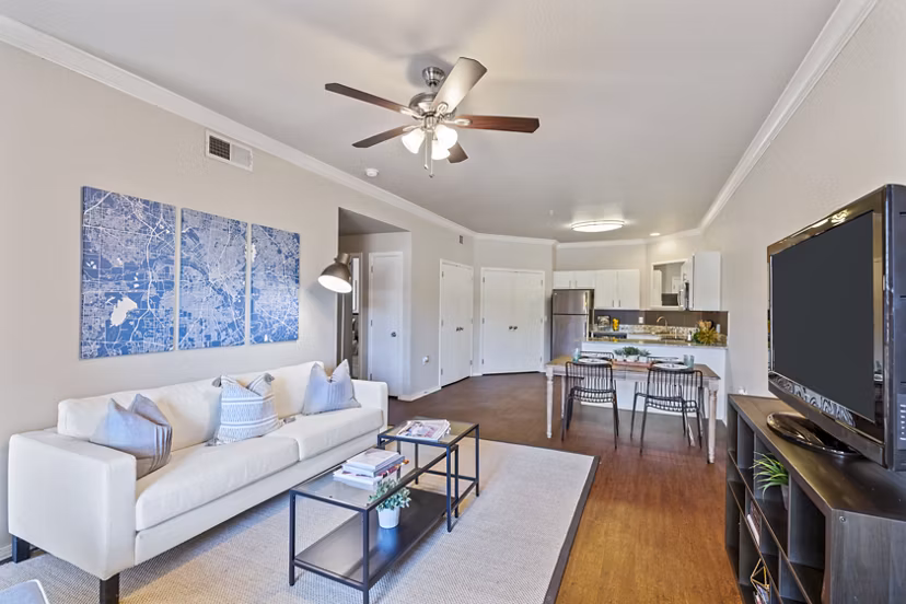Spacious living room with modern decor in Timberlinks at Denton Apartments
