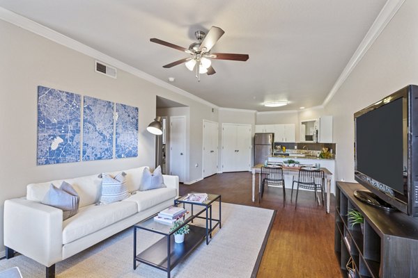 Spacious living room with modern decor in Timberlinks at Denton Apartments