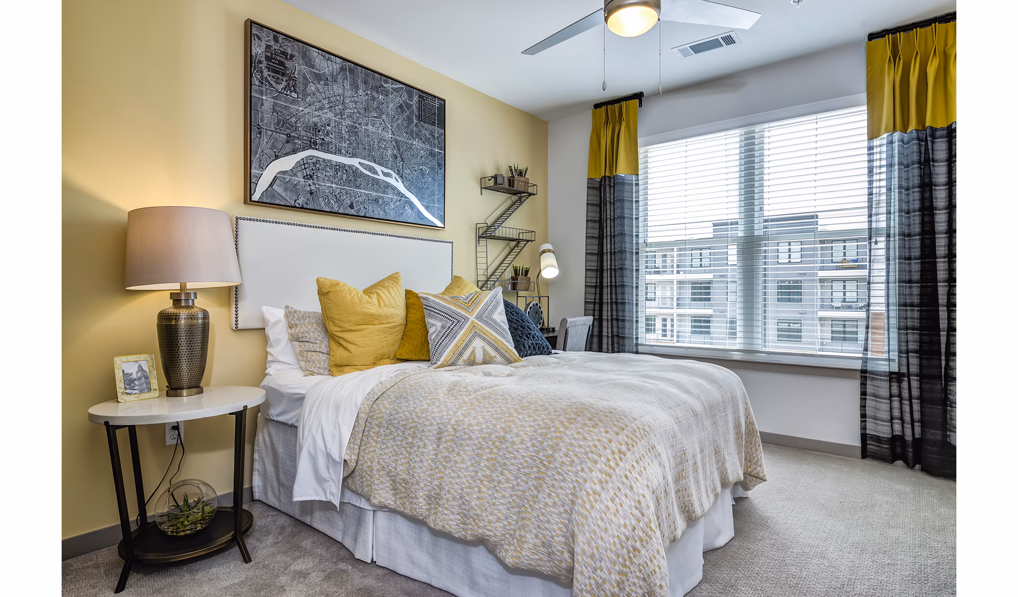 Modern bedroom with elegant decor at One Riverwalk Apartments