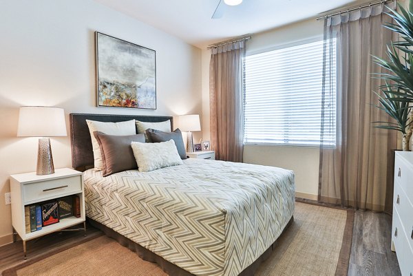 bedroom at The Met at Fashion Center Apartments