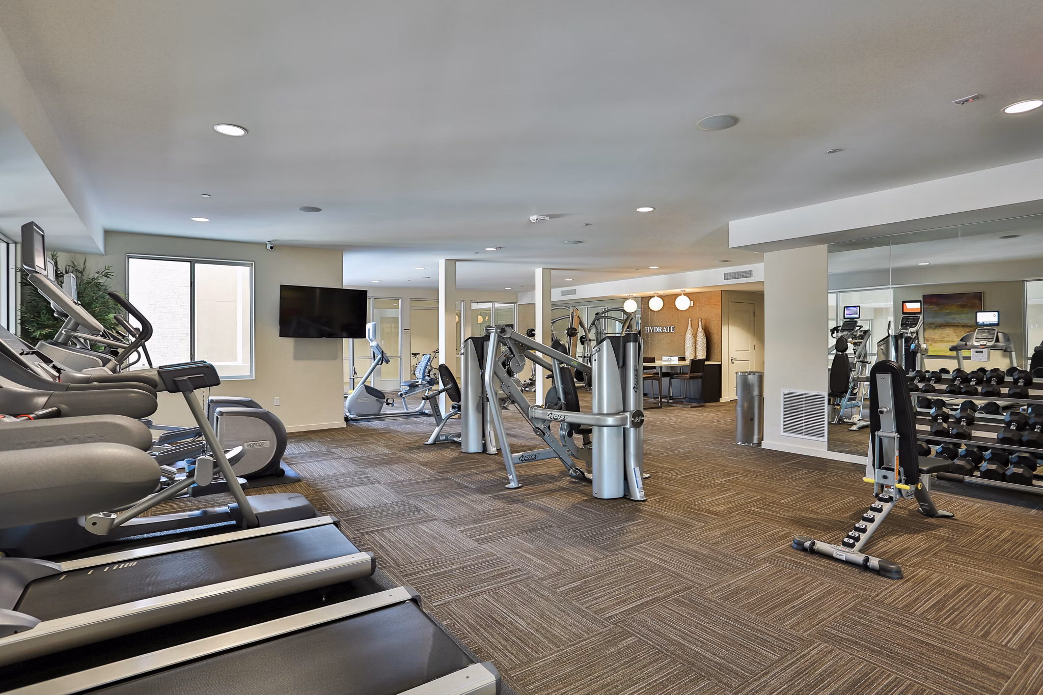 fitness center at The Met at Fashion Center Apartments