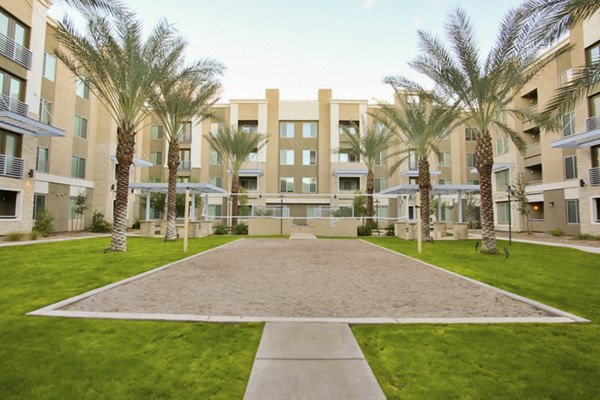 volleyball court at The Met at Fashion Center Apartments