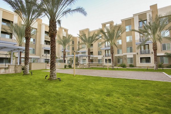 volleyball court at The Met at Fashion Center Apartments