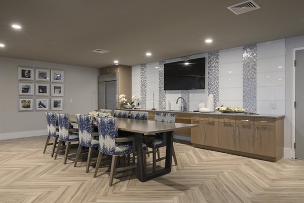 Stylish clubhouse with cozy seating and modern decor at Everleigh Cape Cod, perfect for social gatherings and relaxation
