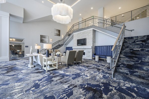 Clubhouse featuring modern interiors and cozy seating areas at Everleigh Cape Cod
