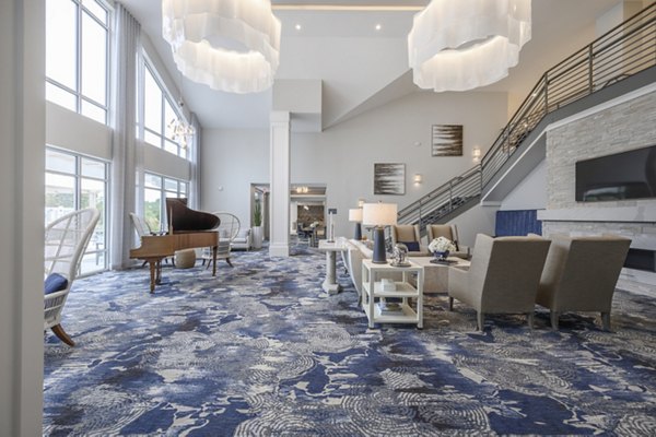 Clubhouse with elegant design at Everleigh Cape Cod, offering residents a luxurious space for social gatherings and relaxation