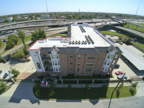 Modern luxury apartments near a highway interchange in a vibrant urban area