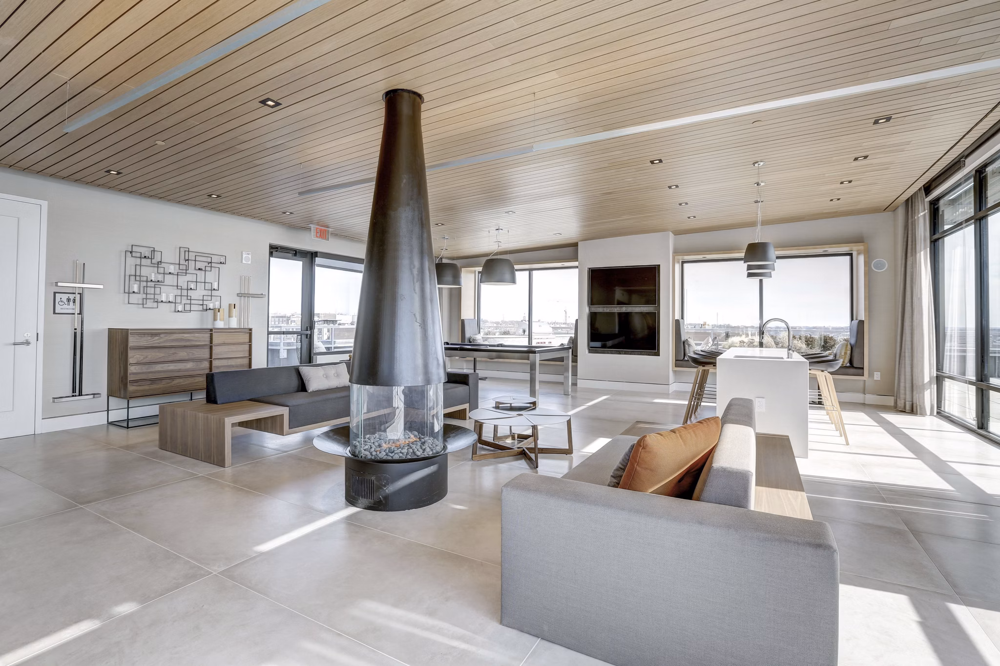 Sonnet Apartments: Elegant clubhouse featuring modern design and plush seating areas in a luxury community