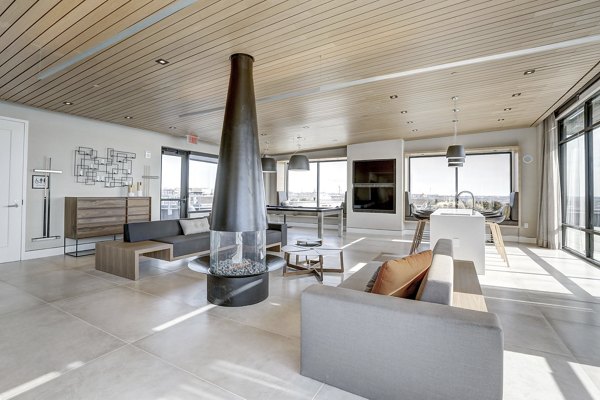 Sonnet Apartments: Elegant clubhouse featuring modern design and plush seating areas in a luxury community