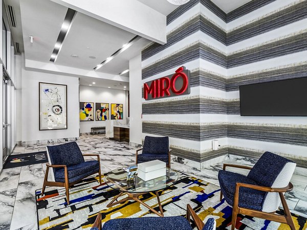 Clubhouse lobby with modern furnishings at Miro Apartments, a luxury Greystar property