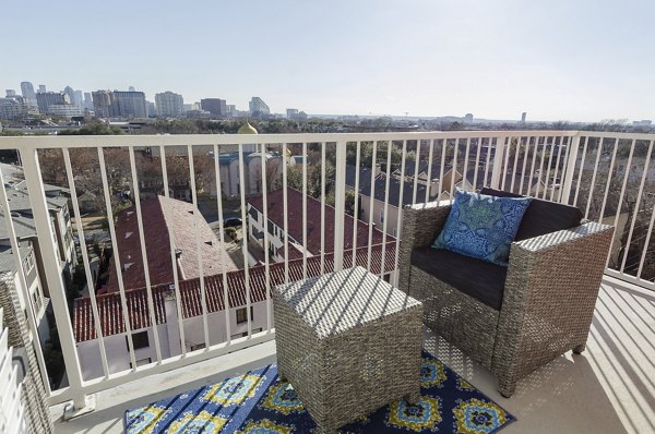 Chic outdoor patio with stylish furniture at Park 4200 Apartments, perfect for relaxation in a luxury setting