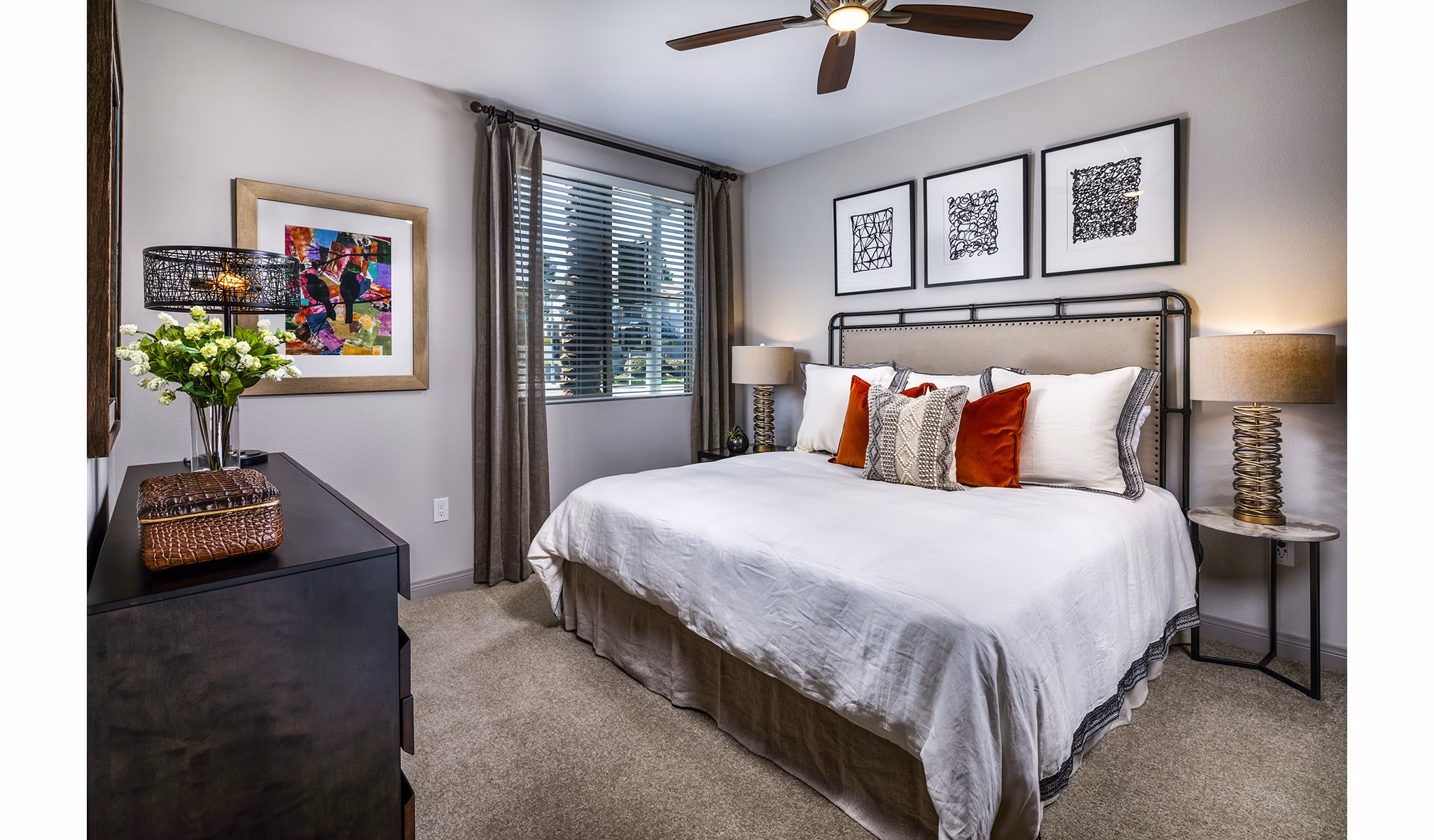 Modern bedroom with stylish decor at Core at Sycamore Highlands apartments
