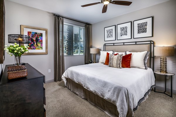 Modern bedroom with stylish decor at Core at Sycamore Highlands apartments