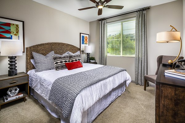 Elegant bedroom with modern decor at Core at Sycamore Highlands luxury apartments