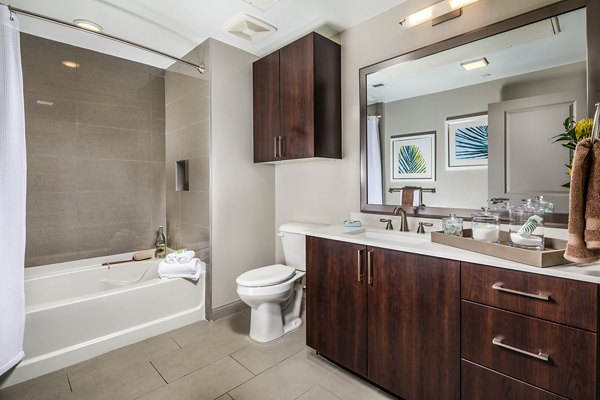 Bathroom featuring modern fixtures and elegant tiles at Core at Sycamore Highlands luxury apartments