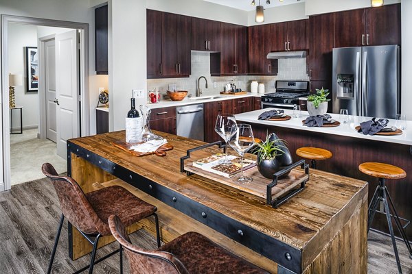 Dining room with modern decor and ample sunlight at Core at Sycamore Highlands apartments