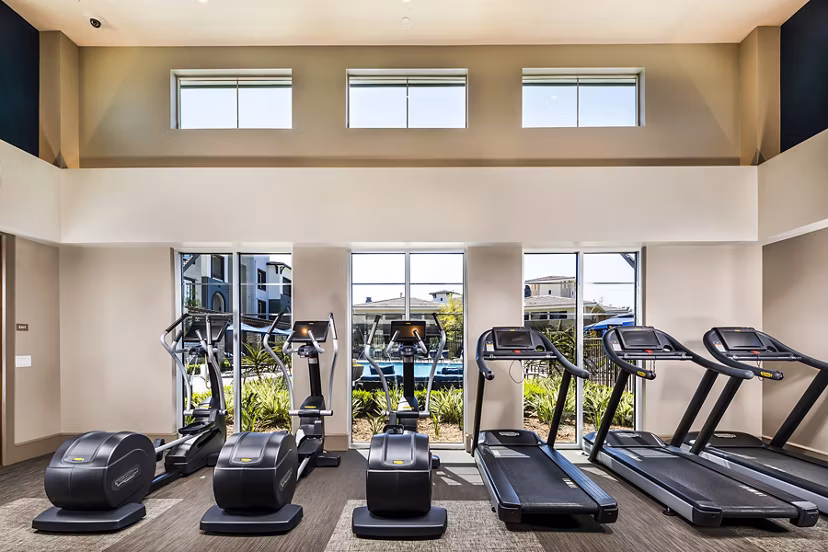 Fitness center with modern equipment at Core at Sycamore Highlands luxury apartments