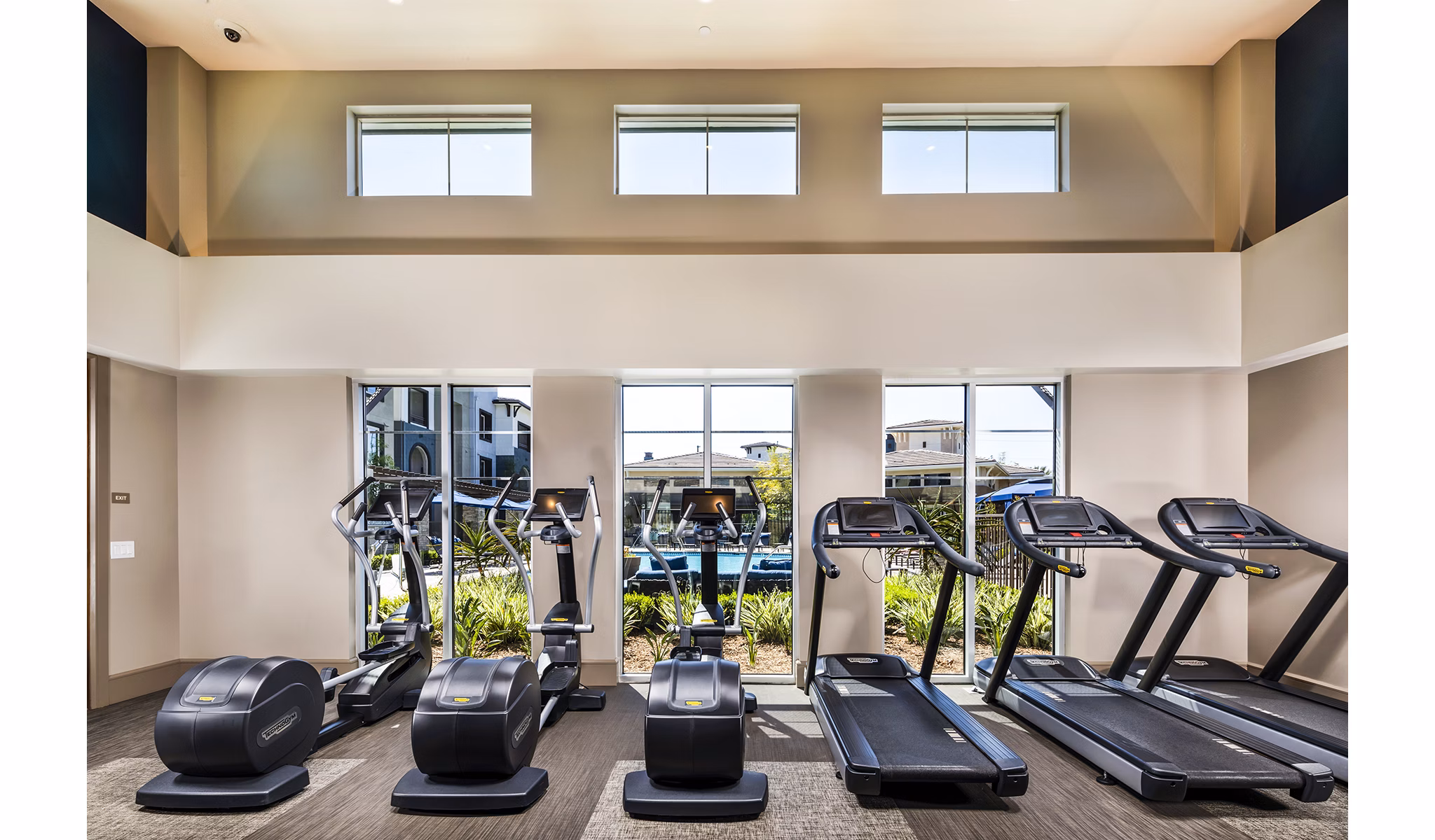 Fitness center with modern equipment at Core at Sycamore Highlands luxury apartments