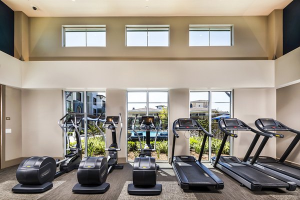 Fitness center with modern equipment at Core at Sycamore Highlands luxury apartments
