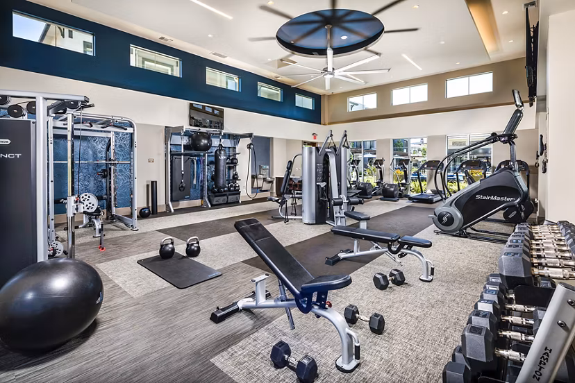 Modern fitness center with state-of-the-art equipment at Core at Sycamore Highlands luxury apartments