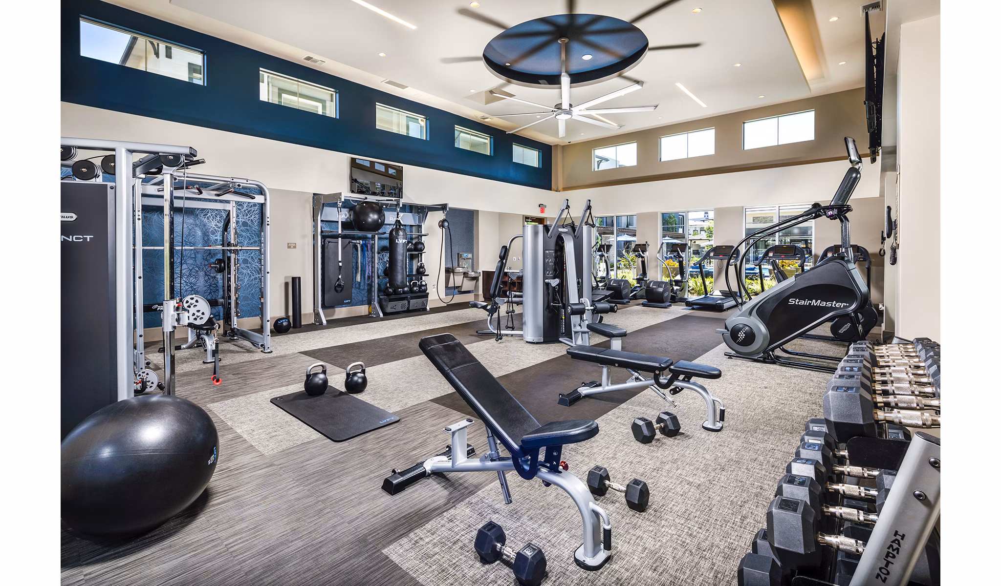 Modern fitness center with state-of-the-art equipment at Core at Sycamore Highlands luxury apartments