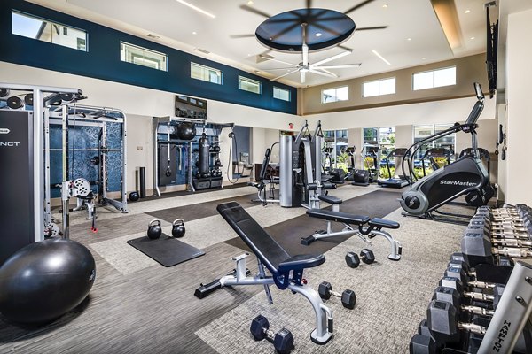 Modern fitness center with state-of-the-art equipment at Core at Sycamore Highlands luxury apartments