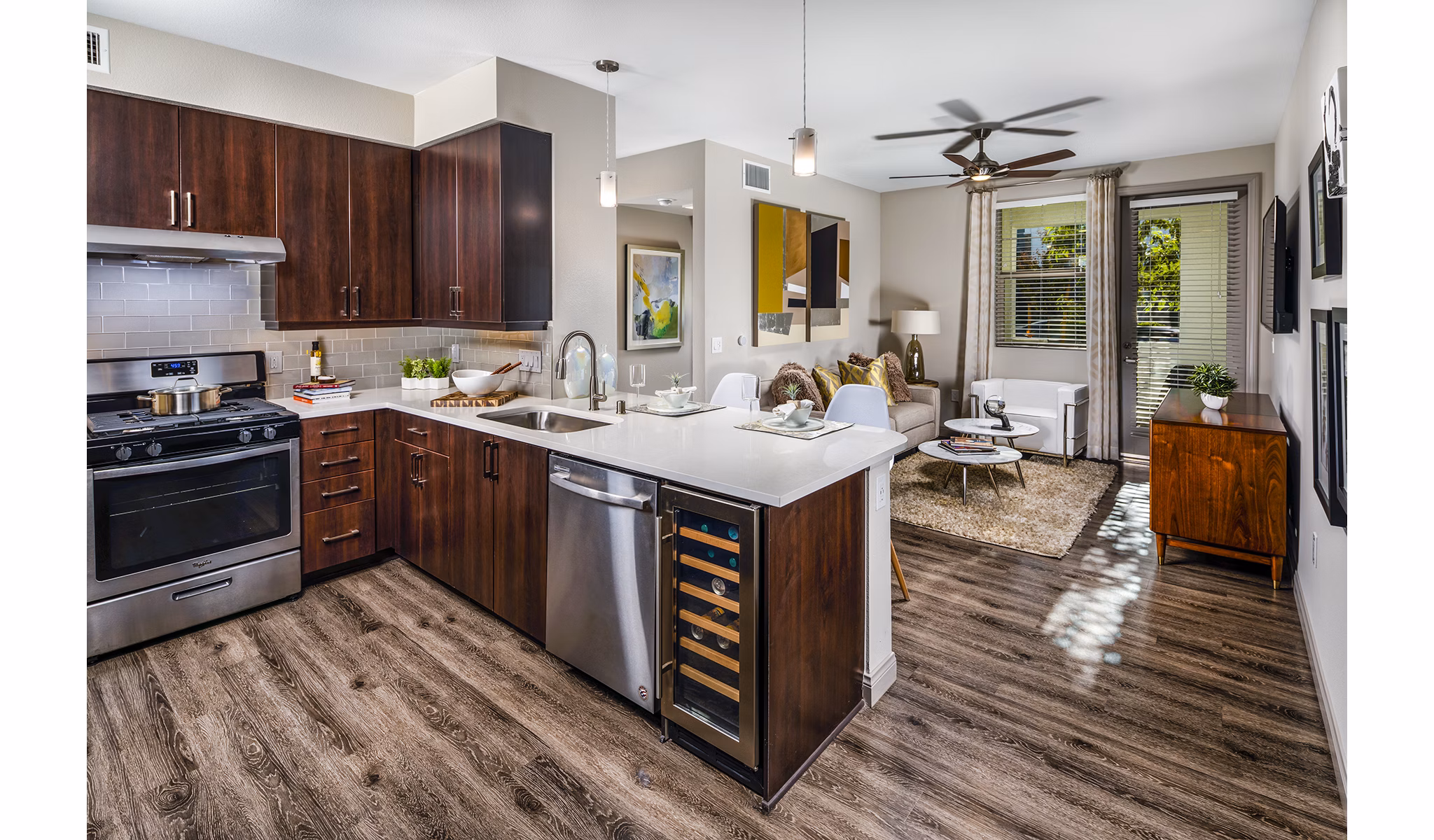 Modern kitchen featuring stainless steel appliances at Core at Sycamore Highlands luxury apartments