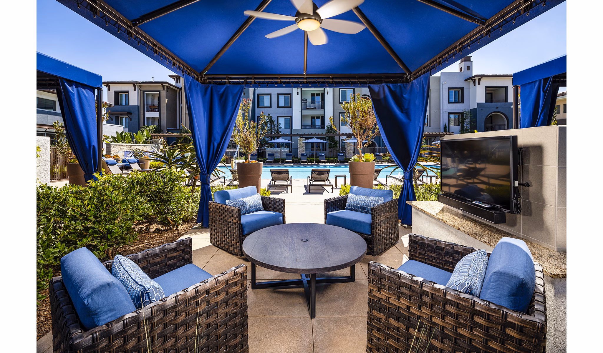 Pool patio at Core at Sycamore Highlands, offering luxurious outdoor seating and serene views