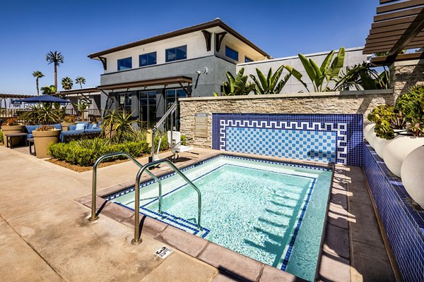Relaxing hot tub at Core at Sycamore Highlands luxury apartments, perfect for unwinding after a long day in Riverside, CA