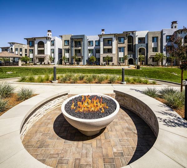 exterior and fire pit at Core at Sycamore Highlands
