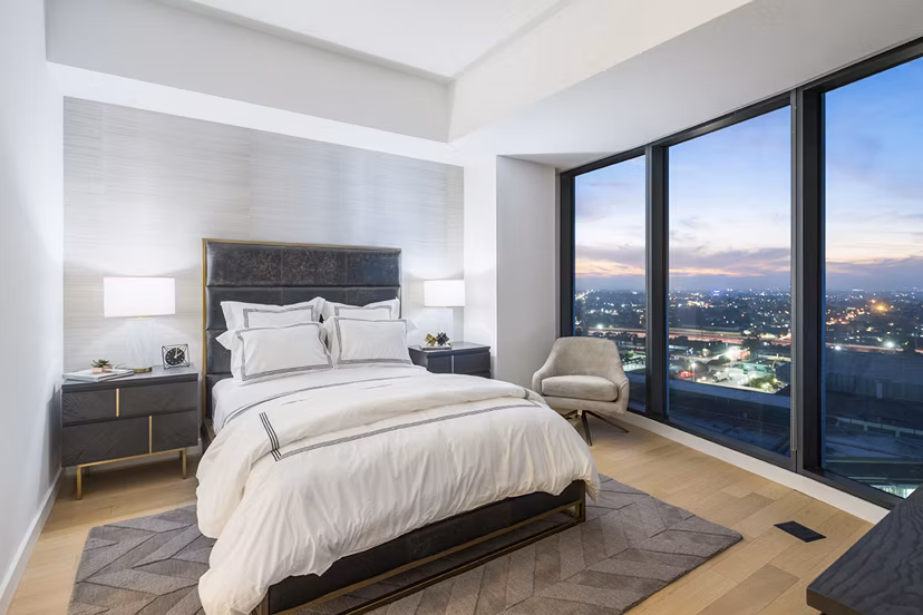 Cozy bedroom with modern decor in Circa LA Apartments, featuring luxury touches in a prime location