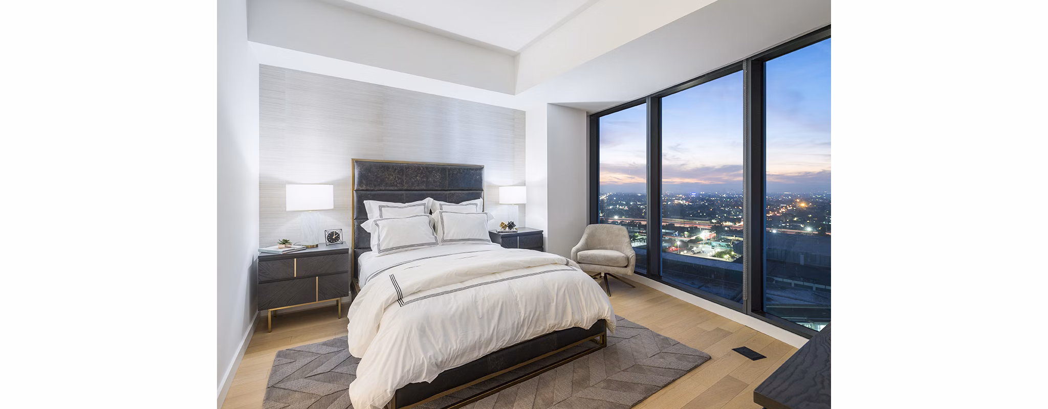 Cozy bedroom with modern decor in Circa LA Apartments, featuring luxury touches in a prime location