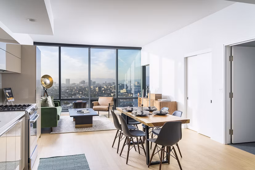 Dining room with modern decor and sleek furniture at Circa LA Apartments, offering a luxury living experience in Los Angeles