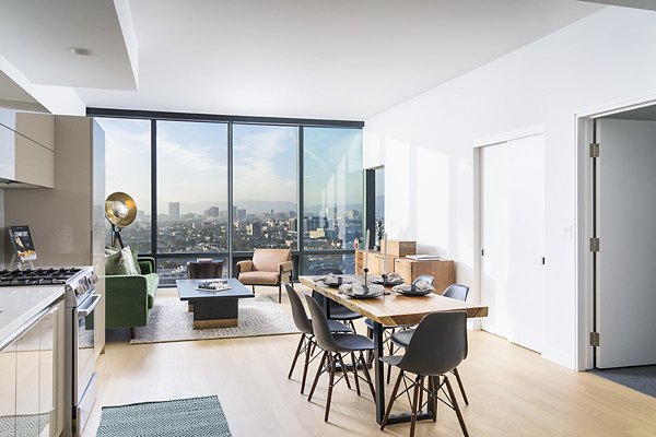 Dining room with modern decor and sleek furniture at Circa LA Apartments, offering a luxury living experience in Los Angeles