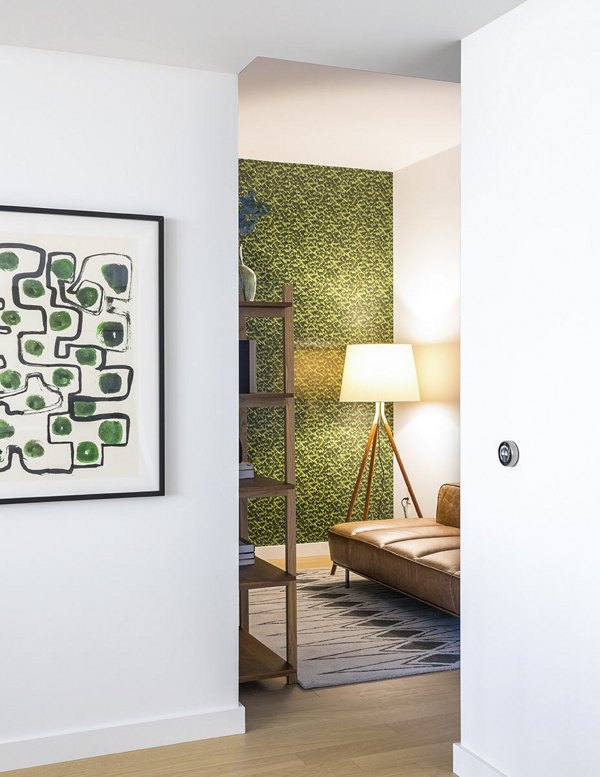 Cozy bedroom with city views at Circa LA Apartments, ideal for luxury living in Los Angeles