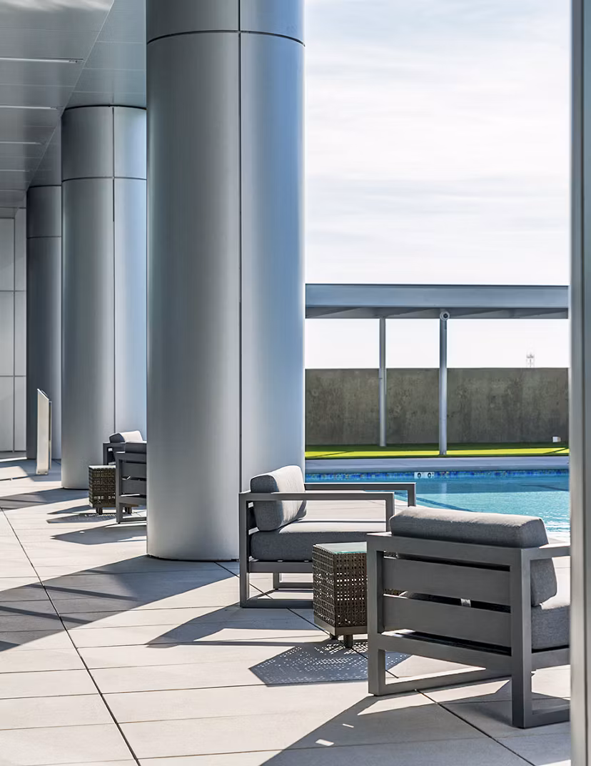 Stylish pool patio with lounge seating at Circa LA Apartments offering a luxurious outdoor experience in the heart of Los Angeles