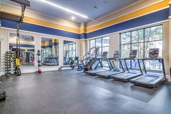 Fitness amenities at The Standard Apartments featuring state-of-the-art gym equipment and spacious workout areas