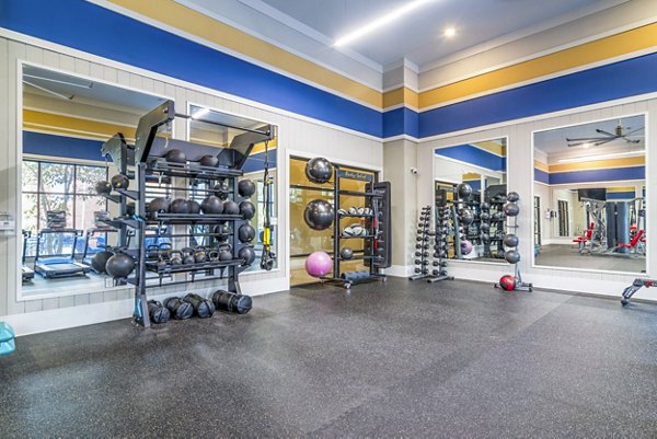 Modern fitness center with state-of-the-art equipment at The Standard Apartments, perfect for maintaining an active lifestyle