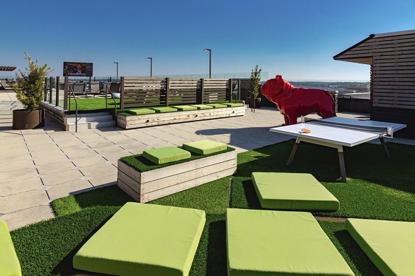 Courtyard with lush landscaping at The Standard at Athens Apartments, offering a serene outdoor space for relaxation and gatherings