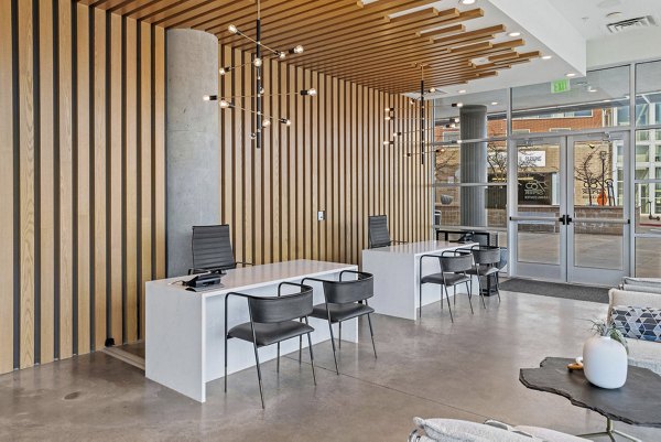 Elegant clubhouse at 2785 Speer Apartments featuring contemporary design and luxury amenities, perfect for social gatherings and events