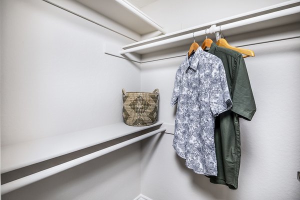 Spacious closet in modern bedroom at Artisan Laguna Beach Apartments, offering luxury storage solutions