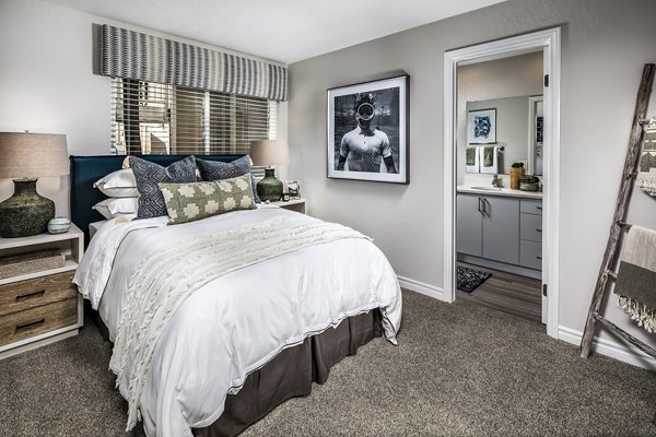 Cozy bedroom with ocean-inspired decor in Artisan Laguna Beach Apartments