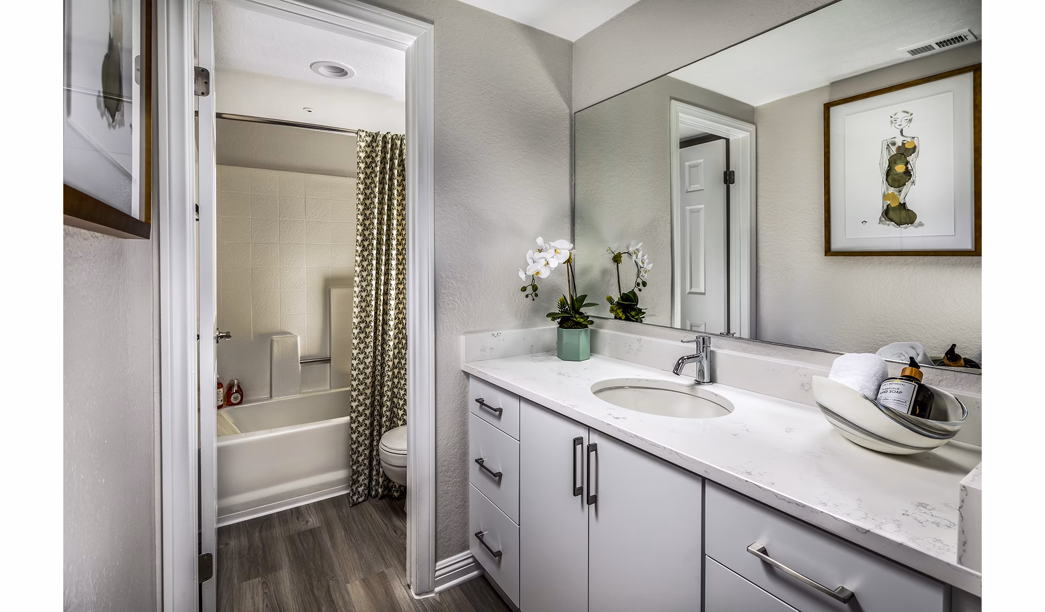 Artisan Laguna Beach: Elegant bathroom with sleek fixtures and modern design in luxury apartments